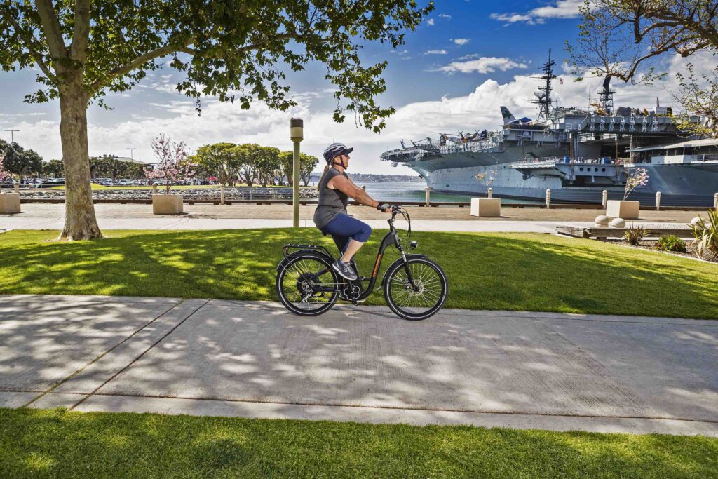 A woman rides a RadCity Step Thru electric commuter bike in San Diego17c122357 6 1